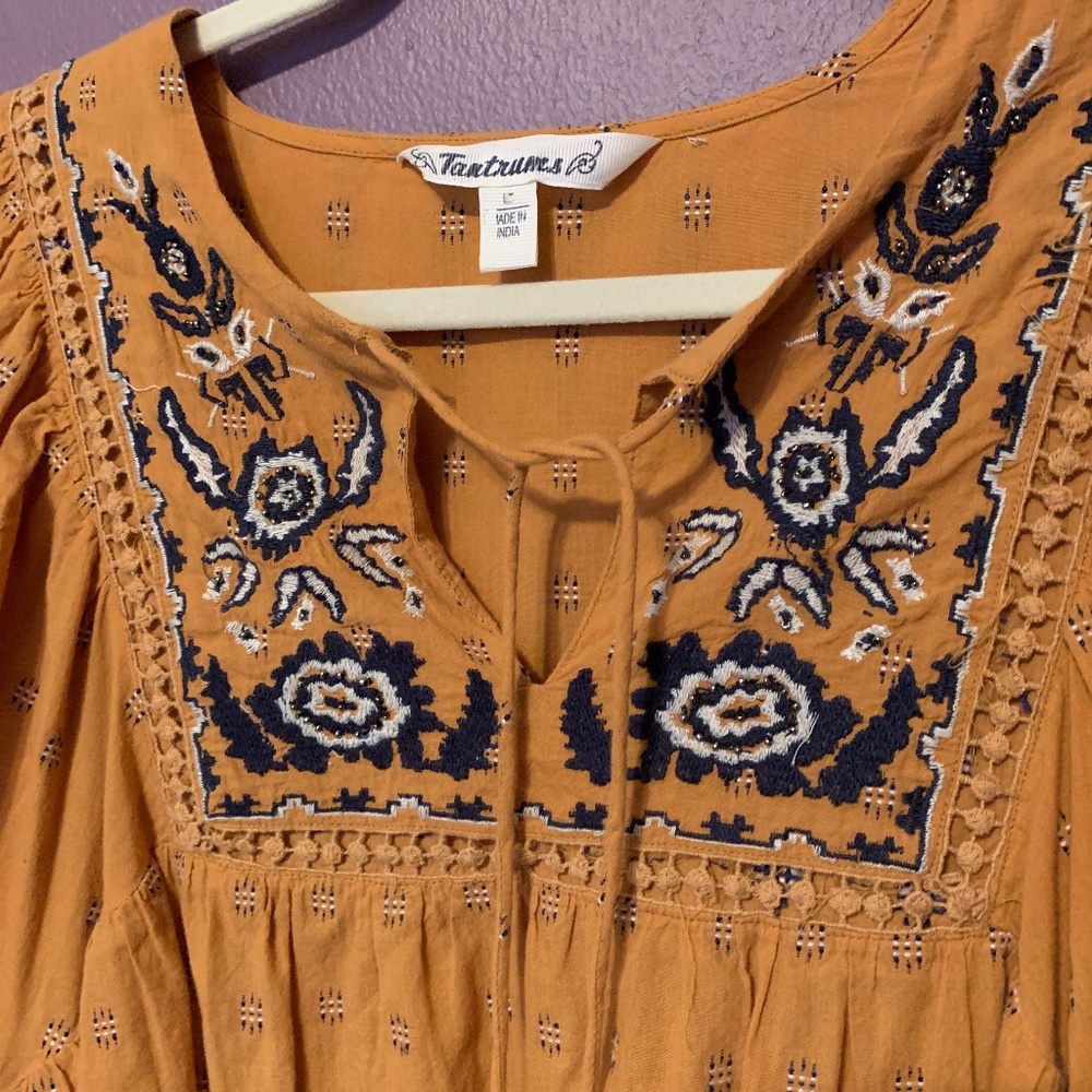 Lovely persimmon smock top with embroidery